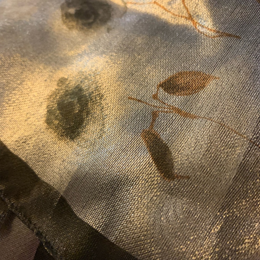 A Brod Silver scarf with floral print